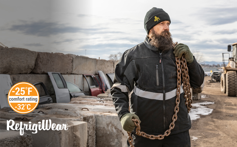 Man working outside in the cold wearing the Enhanced Visibility Insulated Softshell Jacket