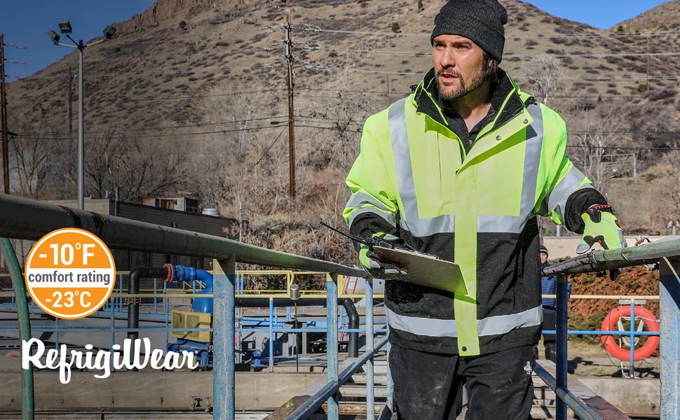 Man outside in the cold wearing the Hivis 3-in-1 Rainwear jacket
